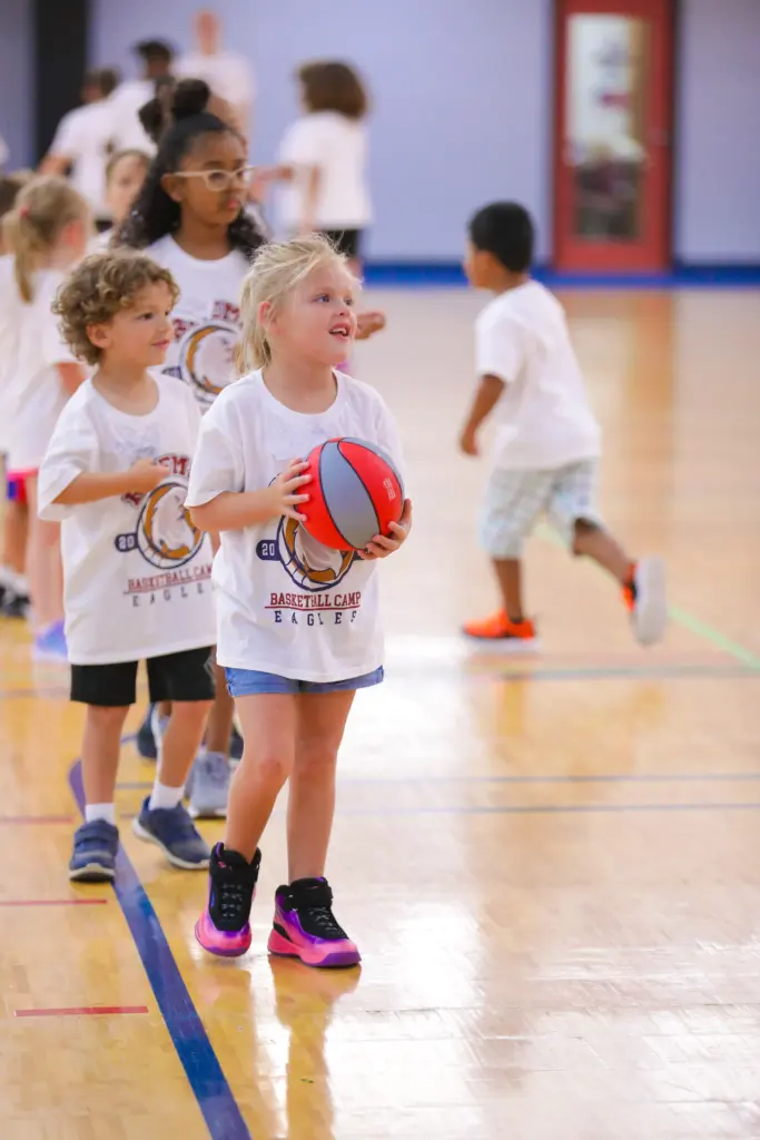 Kids playing basketball at Rhema