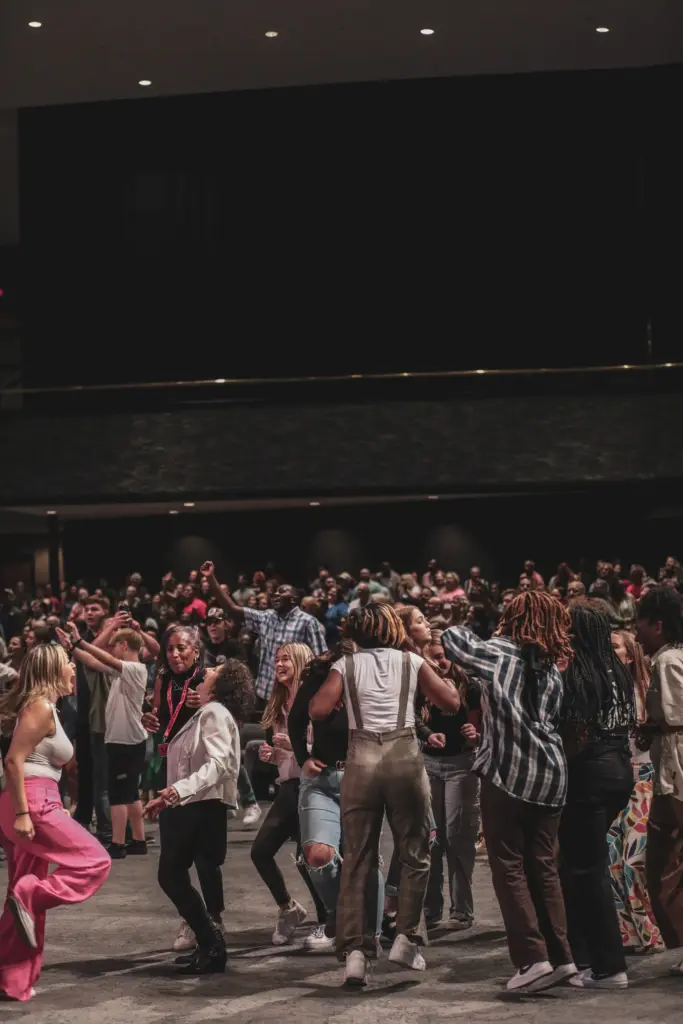 People dancing with joy at Rhema Bible Church