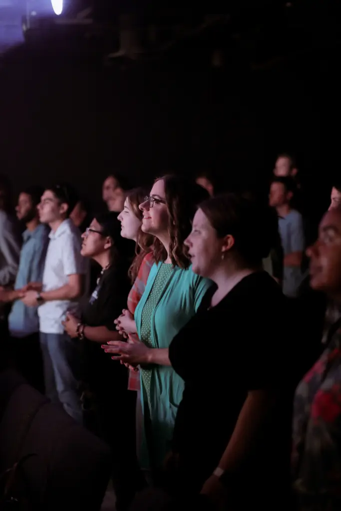 People worshiping at synergy